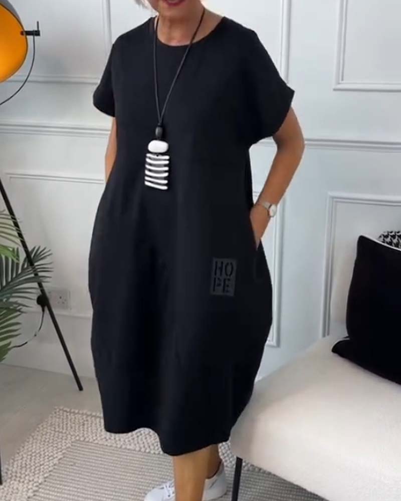 Cleo - Stilfuld kjole med korte ærmer