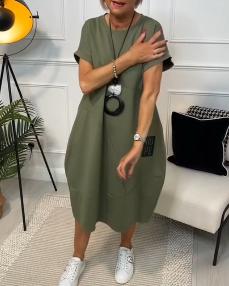 Cleo - Stilfuld kjole med korte ærmer