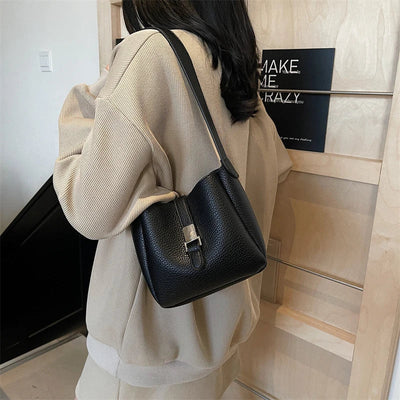 iris™ – moderne bucket taske i læderlook