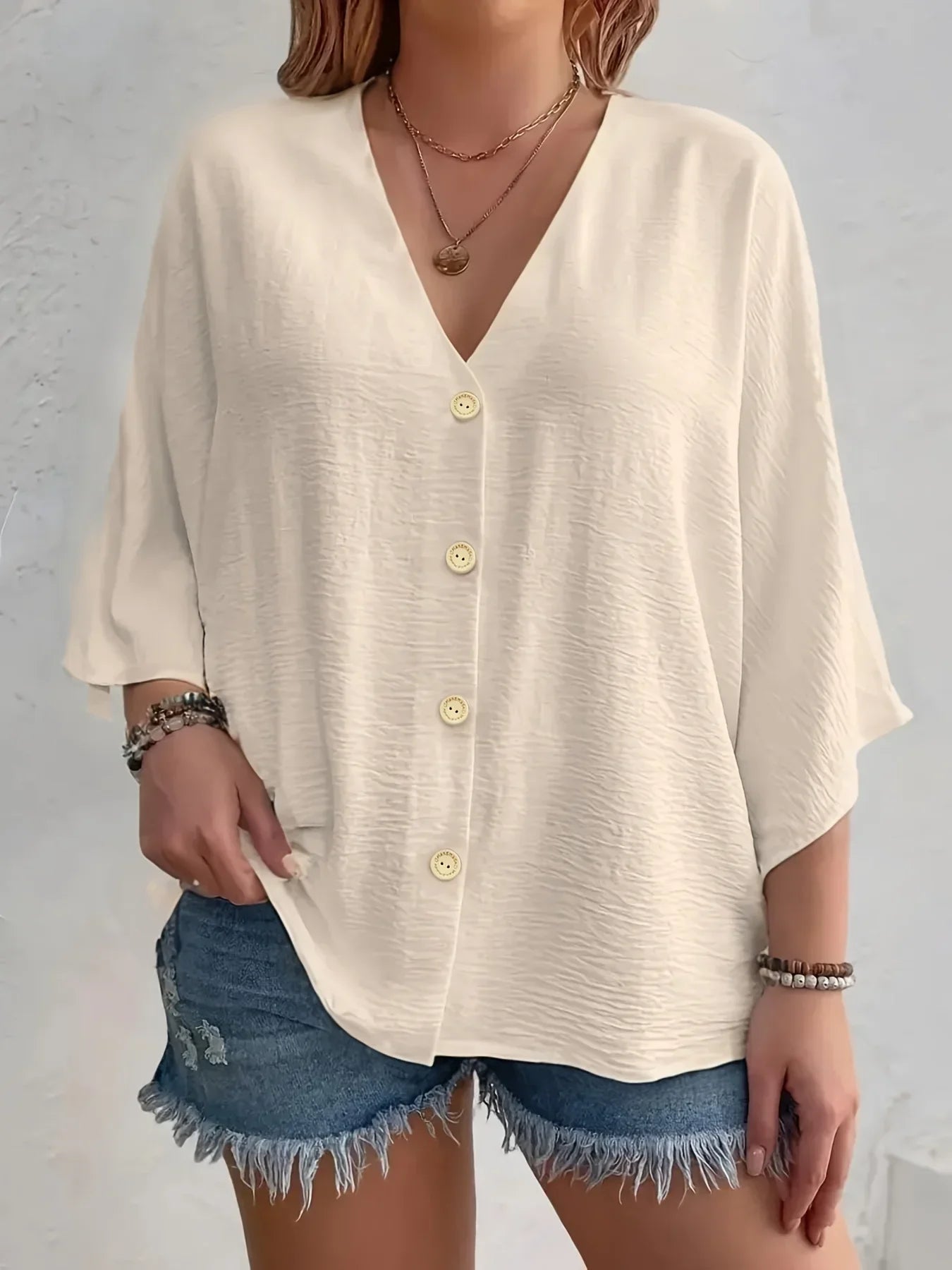 Signe – Bluse med knapper og ¾ ærmer 