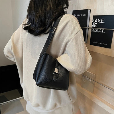 iris™ – moderne bucket taske i læderlook